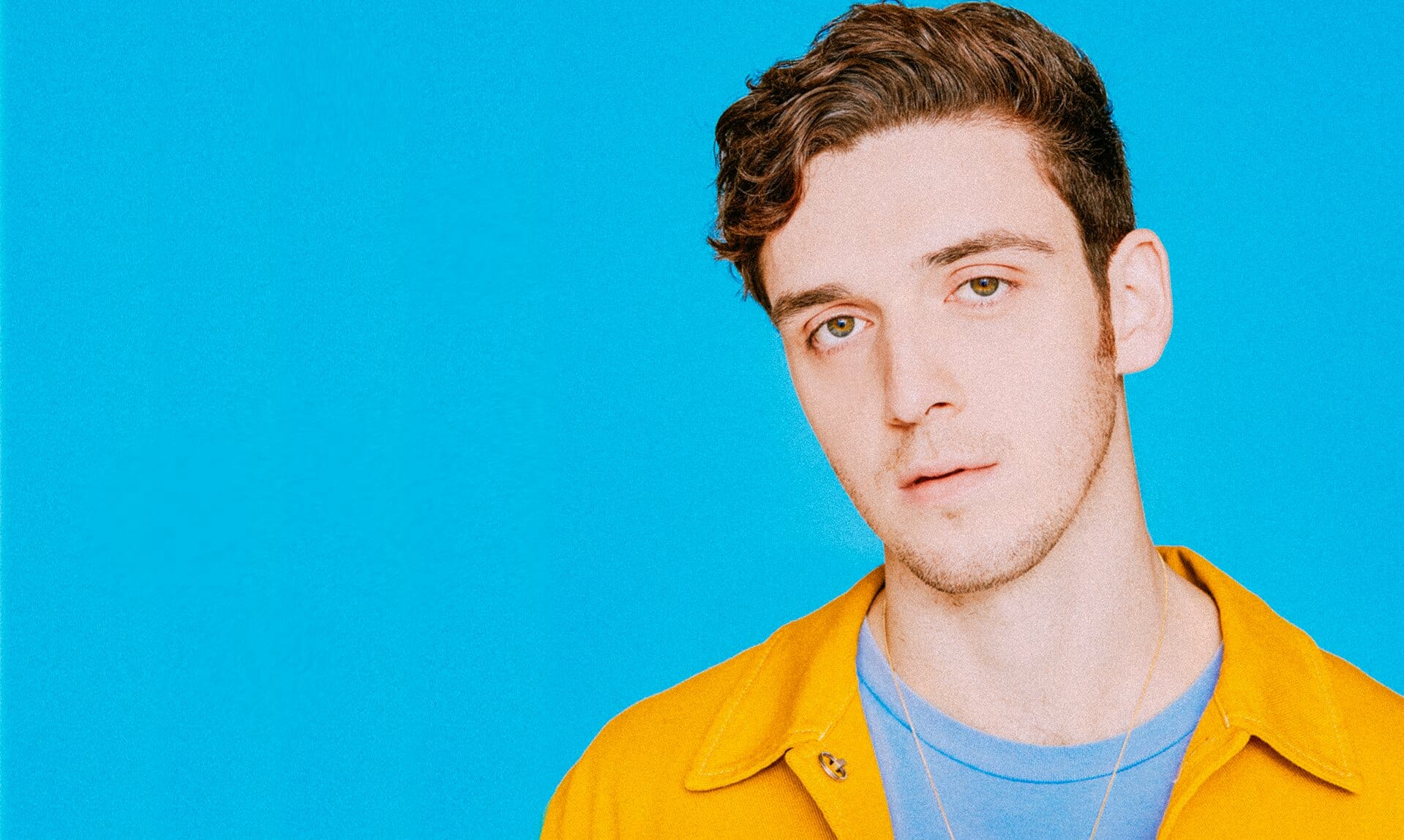 Lauv and Troye Sivan are “so tired of love songs” in new Valentine’s Day video